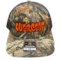 Camouflage cap with 'Owencast' logo on a textured surface