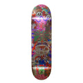 A skateboard deck featuring a highly detailed, colorful graphic illustration with various cartoon characters, patterns, and text, shown against a plain white background.