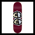 A skateboard deck with a deep burgundy base featuring a graphic of two stylized eyes split vertically in black, cream, and gray.