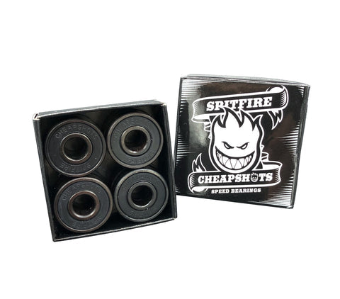 Eight skateboard bearings in a black box with Spitfire logo on a white background