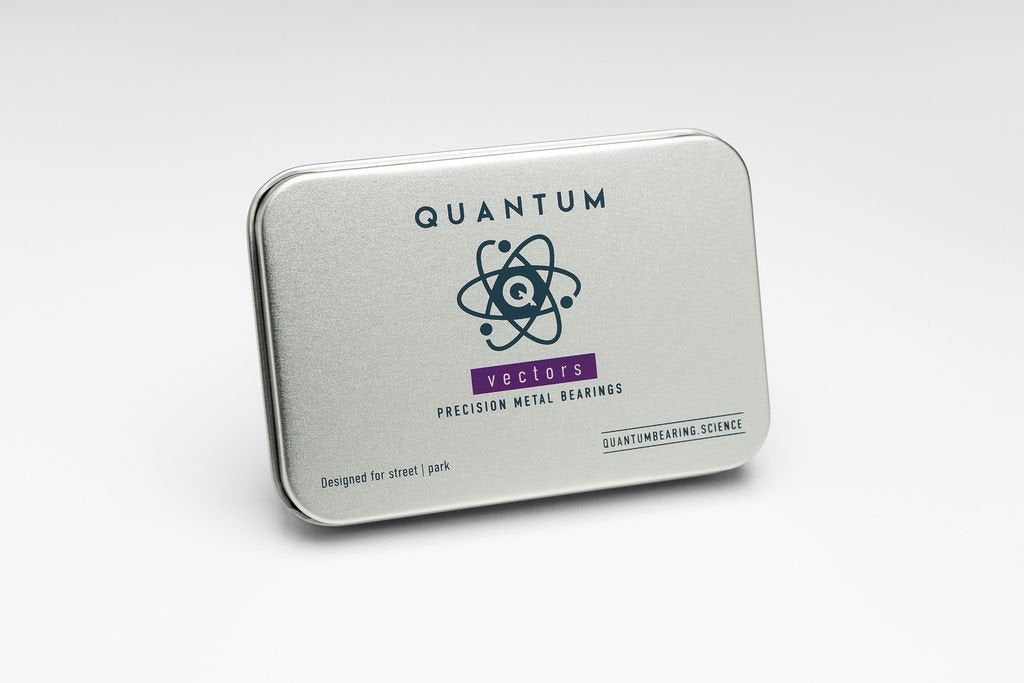 Metal tin with 'Quantum' branding on a white background