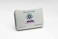 Metal tin with 'Quantum' branding on a white background